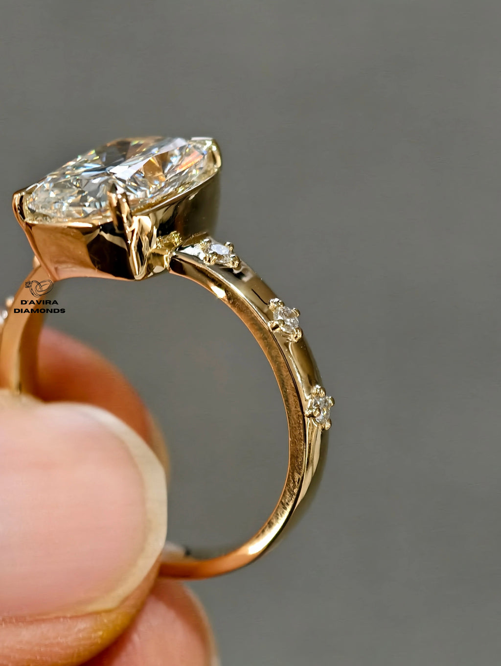 side view cushion cut with star set accent diamond ring