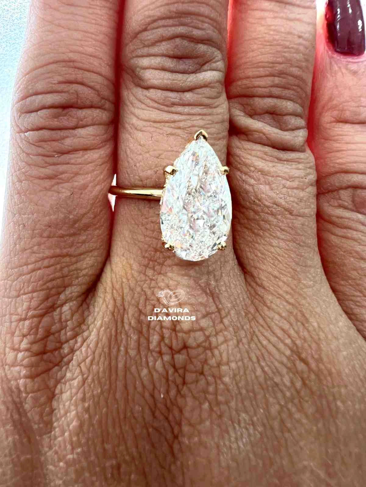 Pear Cut Hidden Halo Anniversary Ring