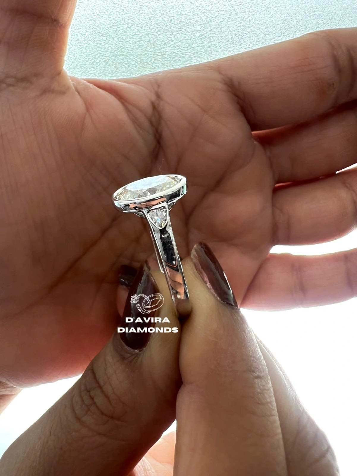 Lab Grown Oval Engagement Ring in Bezel Setting Three Stone style