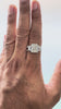 video of three stone emerald cut lab diamond ring