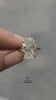 video of  Large oval cut diamond with a yellow gold band and halo ring 