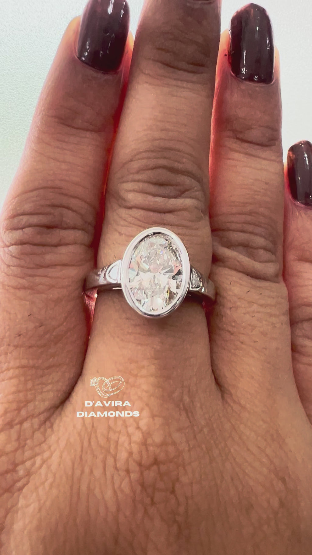 Lab Grown Oval Engagement Ring in Bezel Setting Three Stone style