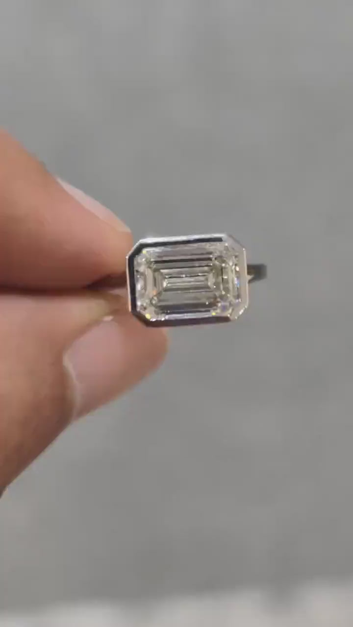 video of Bezel Set Emerald Cut Lab Diamond Ring