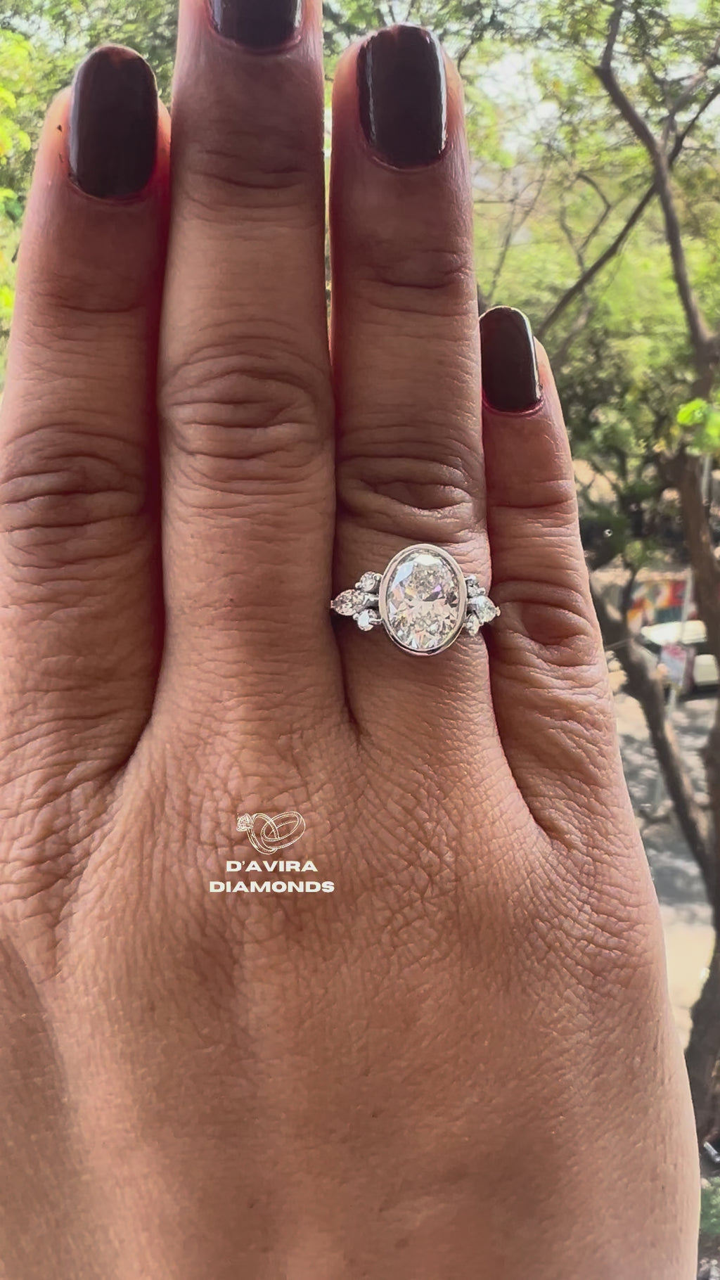 Lab grown oval engagement rings with Bezel Setting Featuring oval Side Stones