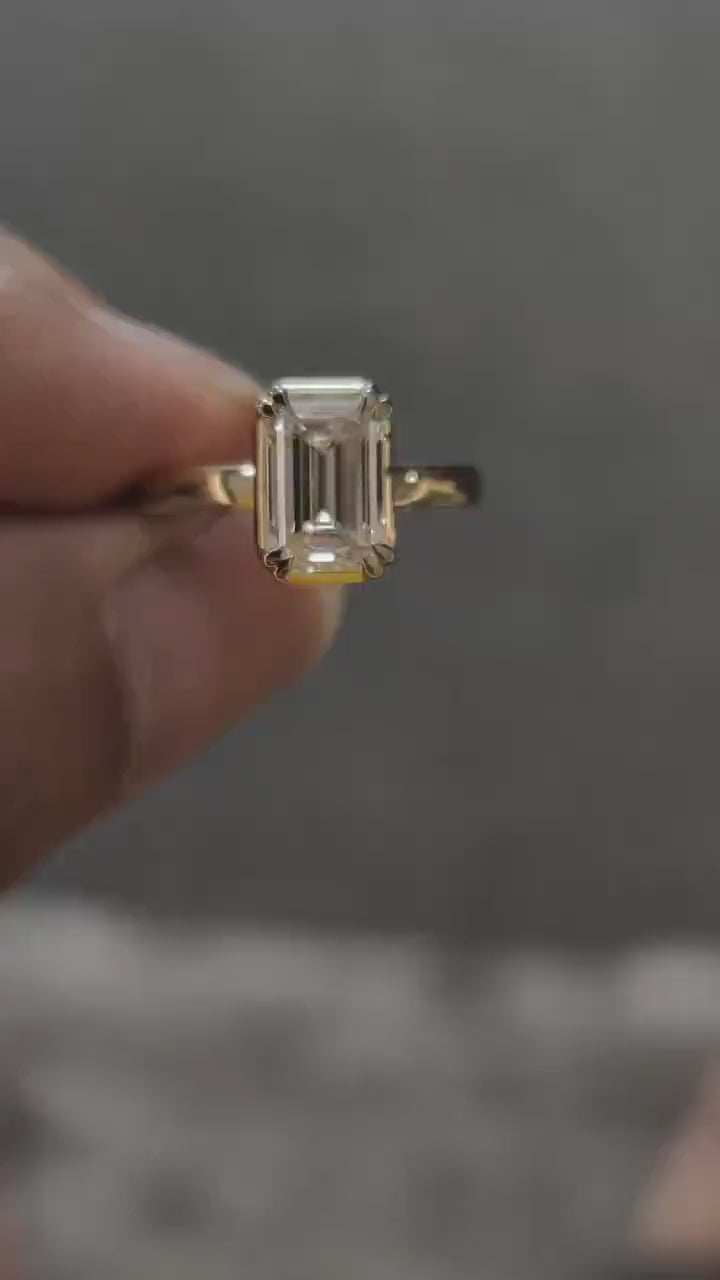 video of solitaire emerald cut lab diamond ring for women