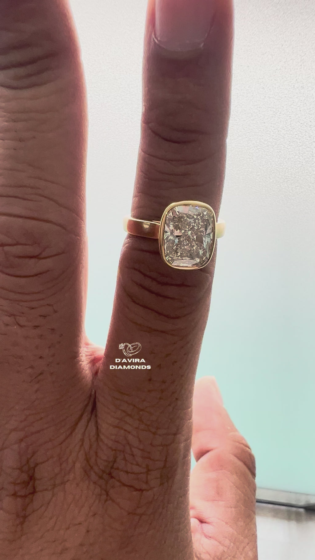Elongated Cushion Cut Diamond Bezel Set Solitaire Ring