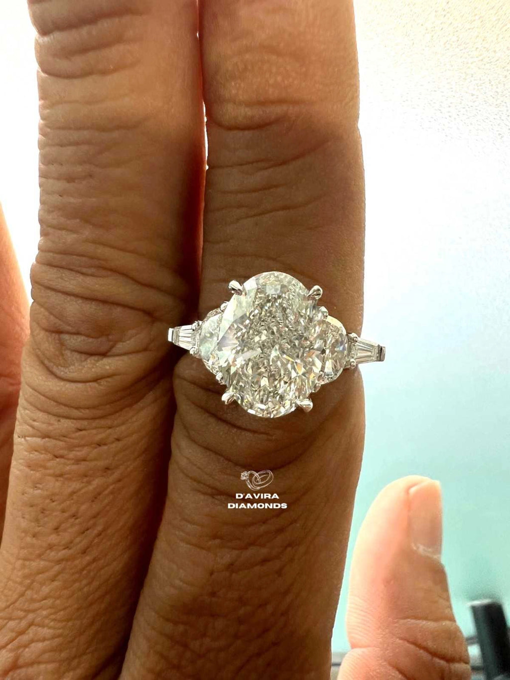 Oval And Half Moon Trio Engagement Diamond Ring