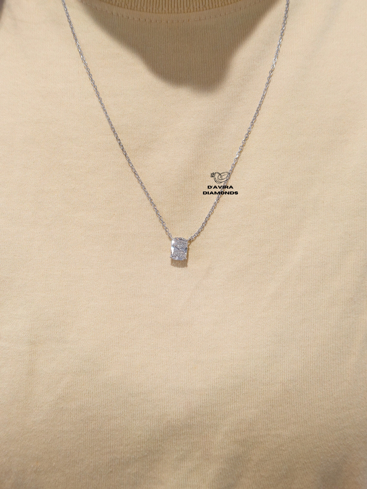 silver necklace featuring a sparkling crystal necklace