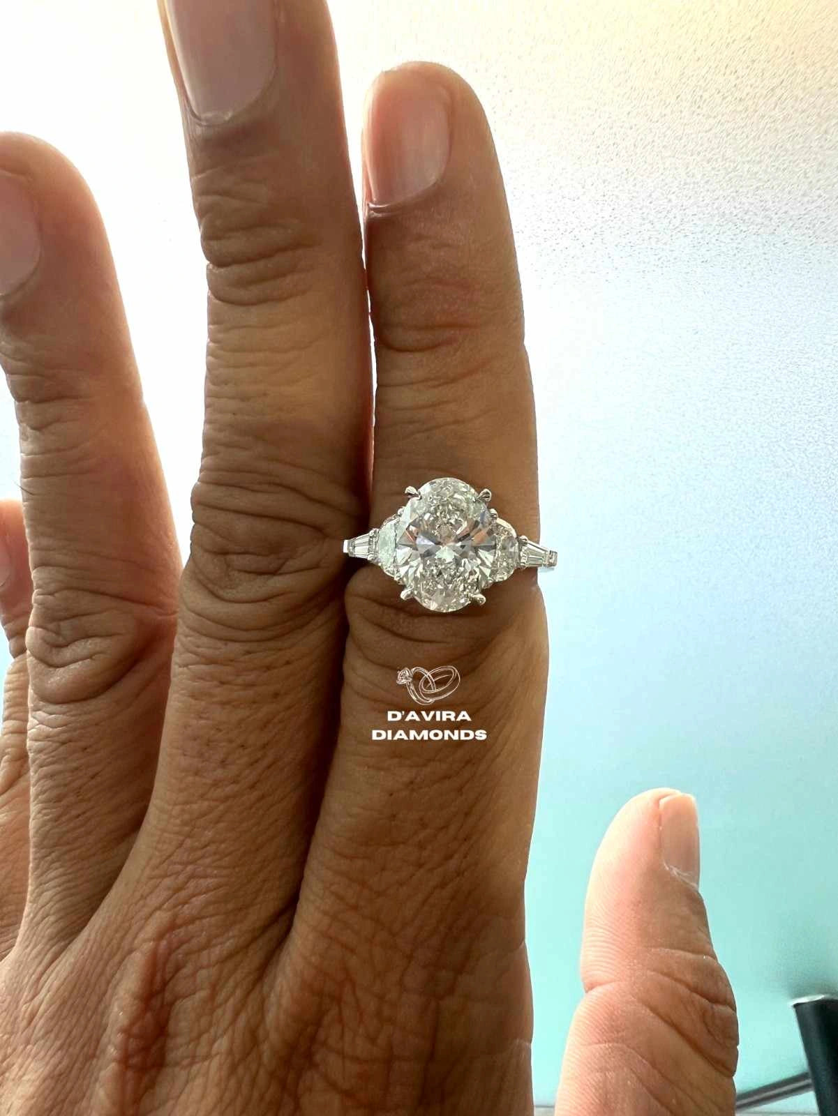 Oval And Half Moon Trio Engagement Diamond Ring
