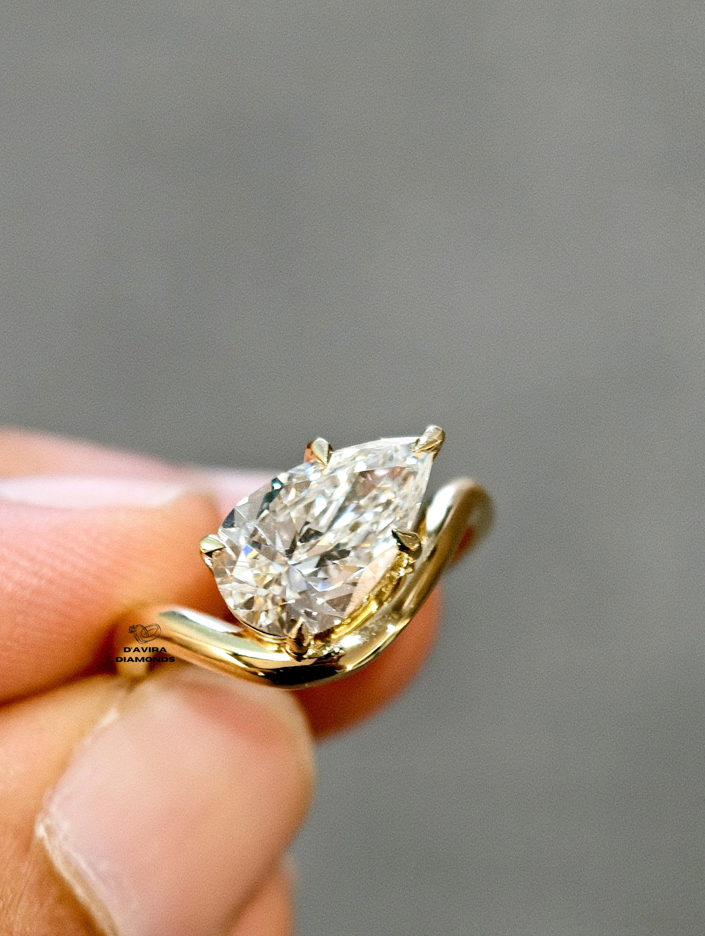 side view of the pear cut lab diamond wedding ring