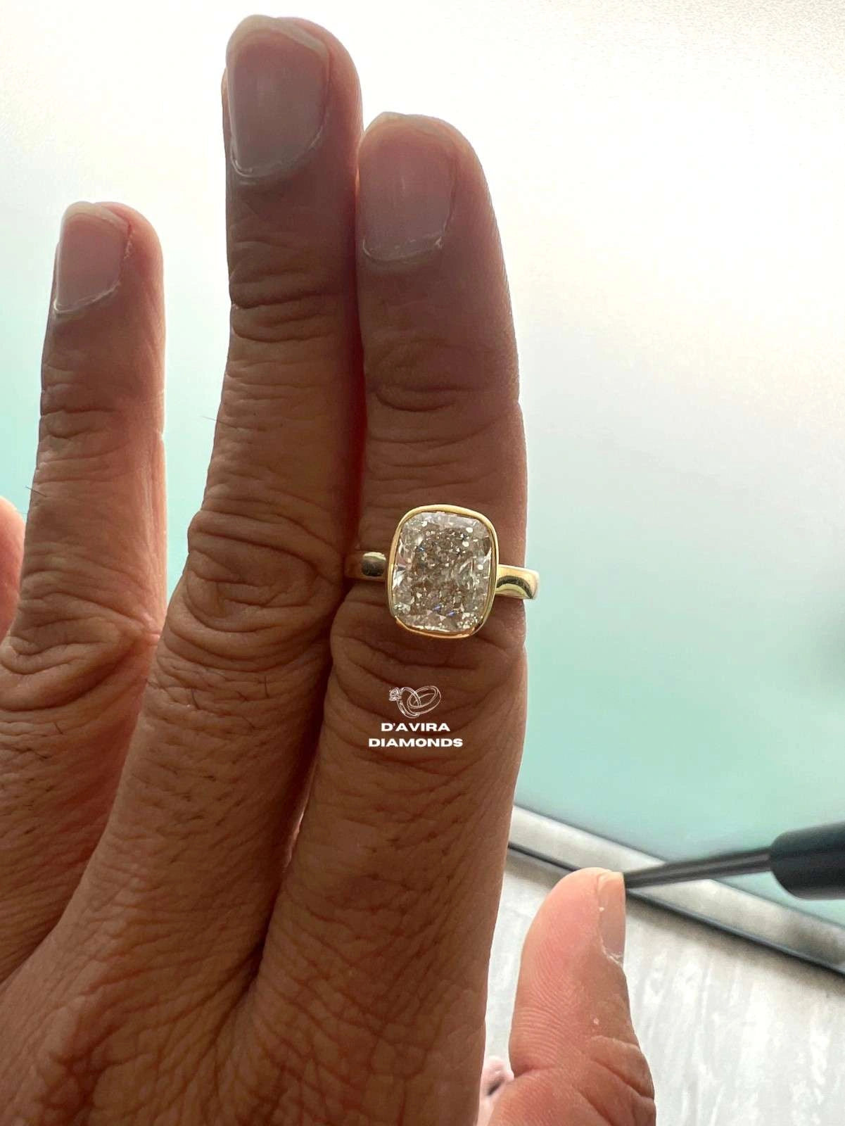 Elongated Cushion Cut Diamond Bezel Set Solitaire Ring