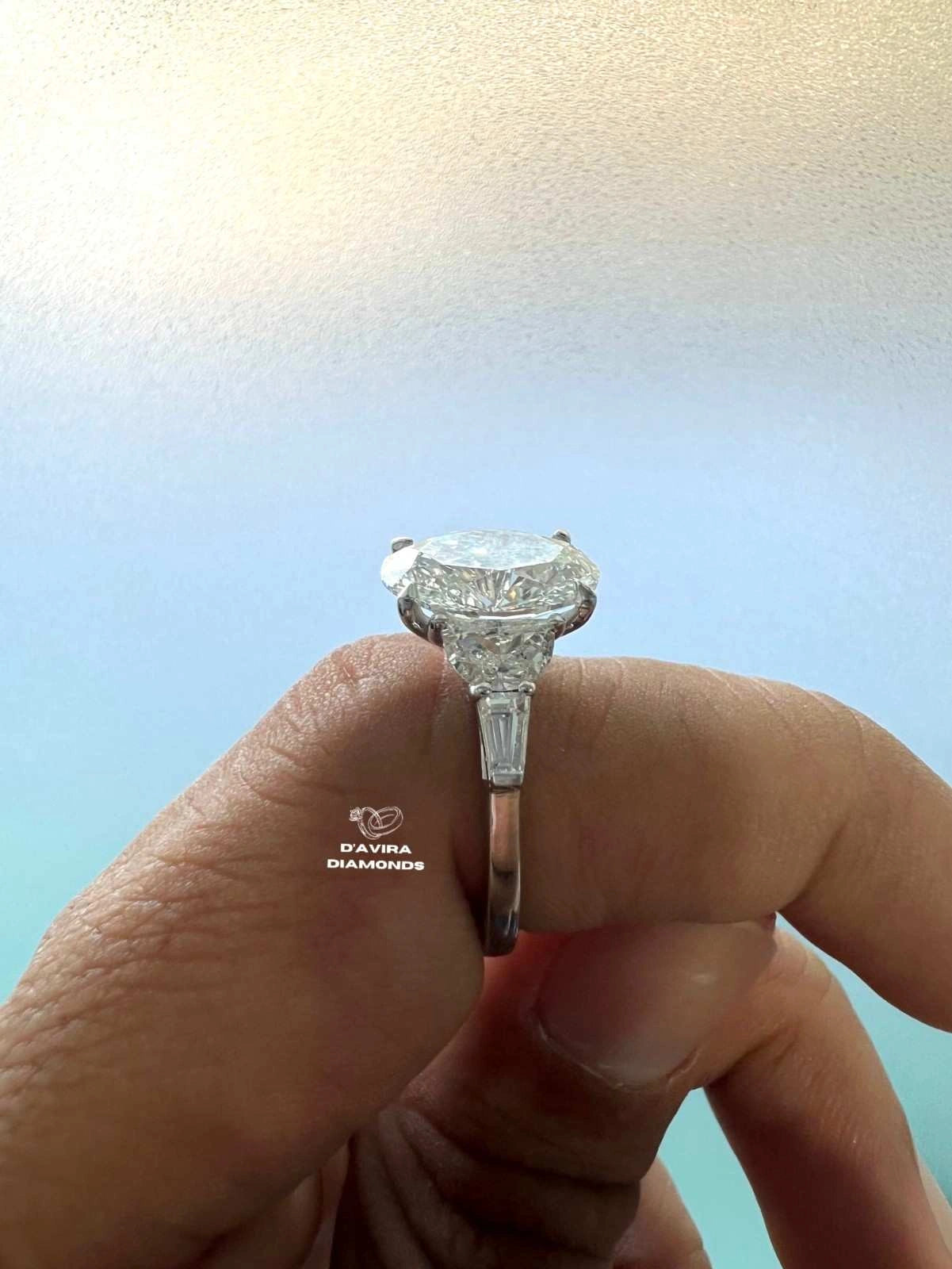 Oval And Half Moon Trio Engagement Diamond Ring