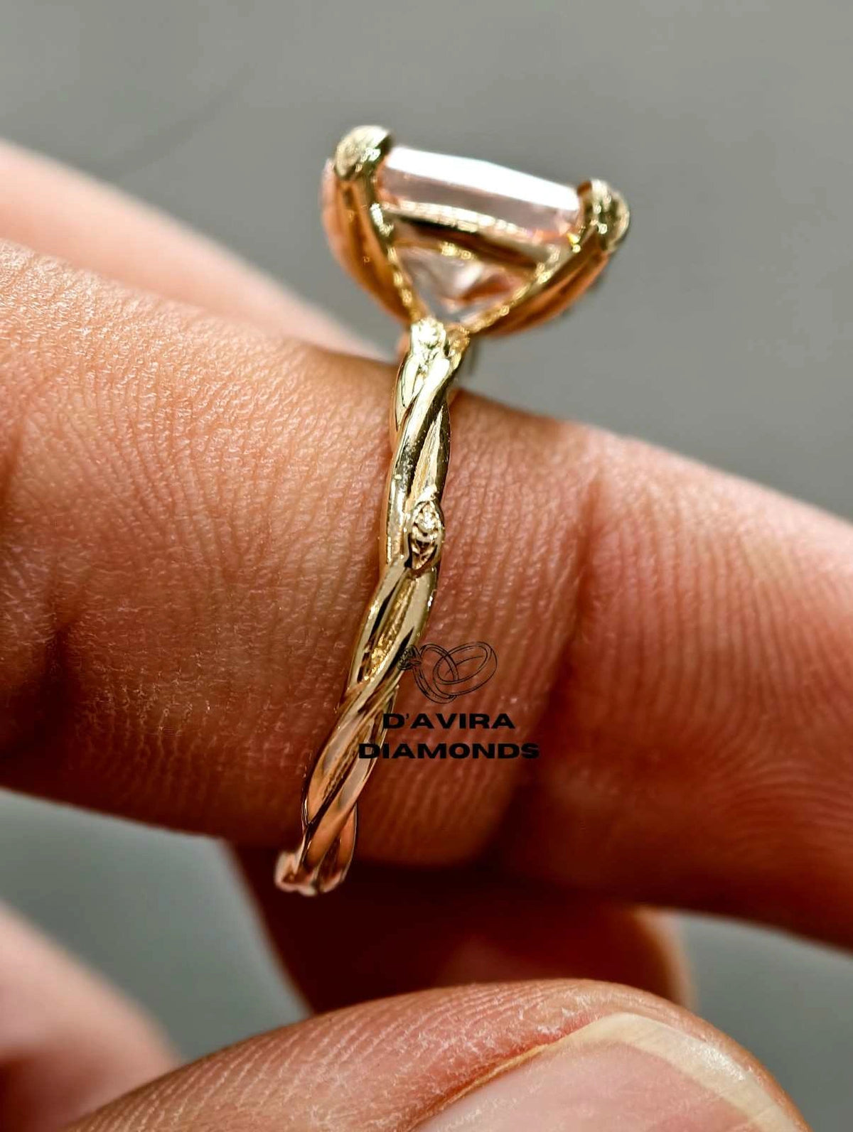 side view of a twisted band design gold ring for women