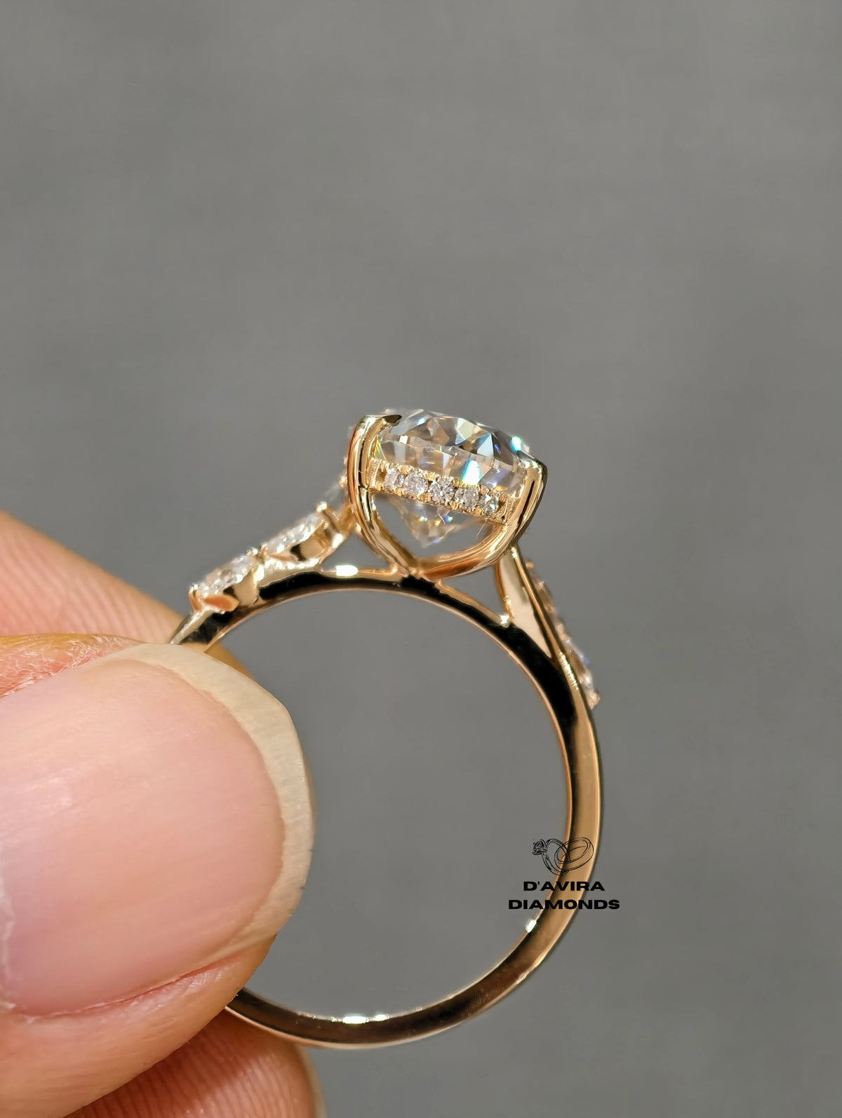 back view of the three stone oval cut basket set lab diamond ring