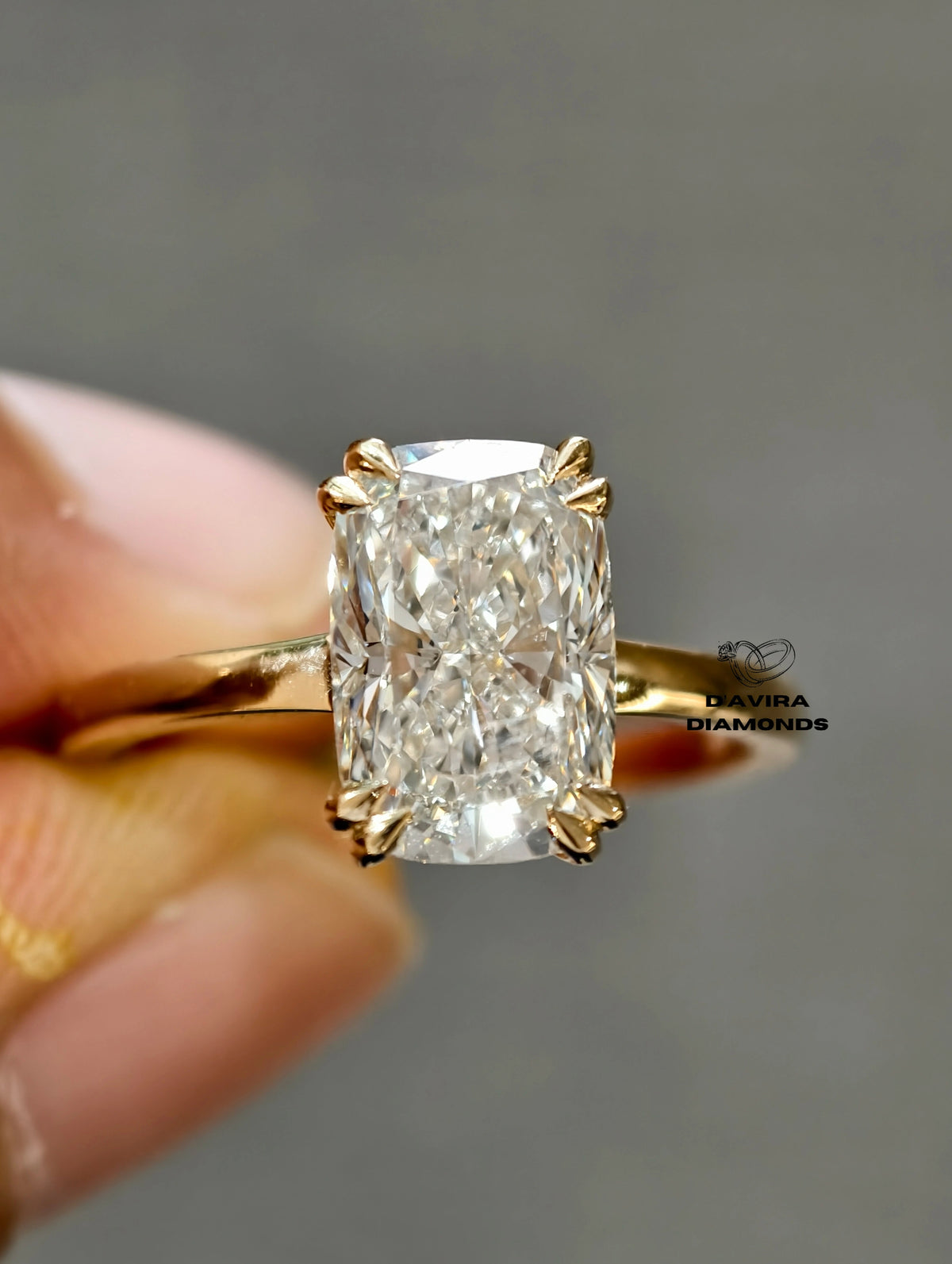 solitaire cushion cut diamond ring