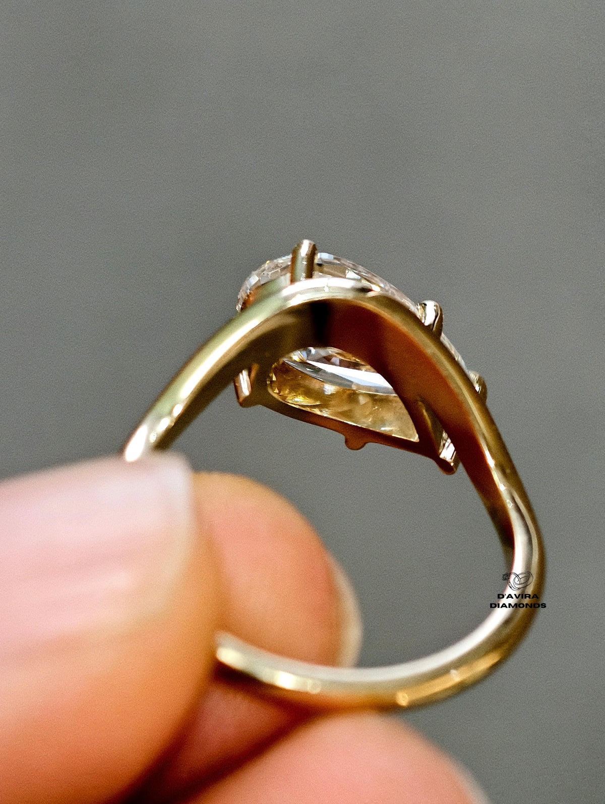 back view of the 14K yellow gold pear cut diamond ring